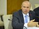 Mantega entrou e saiu por uma entrada privativa do prédio sem falar com a imprensa.