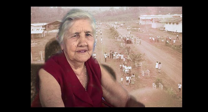 Hilda Travaim sobre vista parcial de um dos primeiros desfiles de Sete de Setembro em Ouro Preto/RO quando ainda era projeto de colonização do Incra. - Arte: Roberto Gutierrez